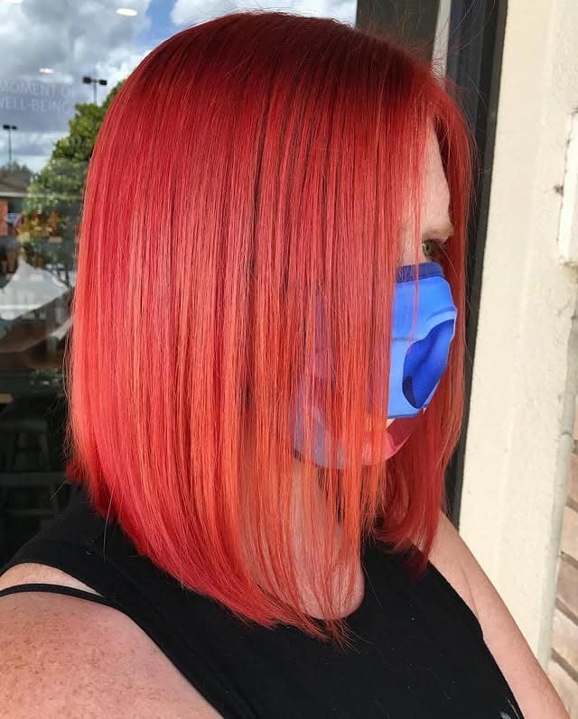 4. Blunt Red Orange Lob - Red Orange Hair Color