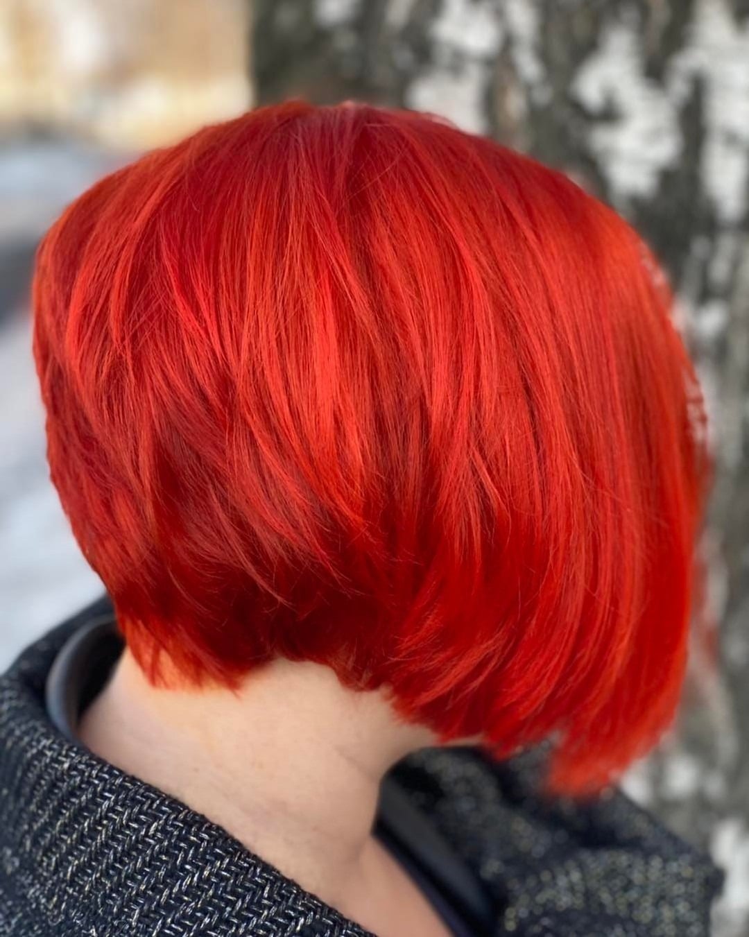 7. Fiery Red Orange French Bob - Red Orange Hair Color