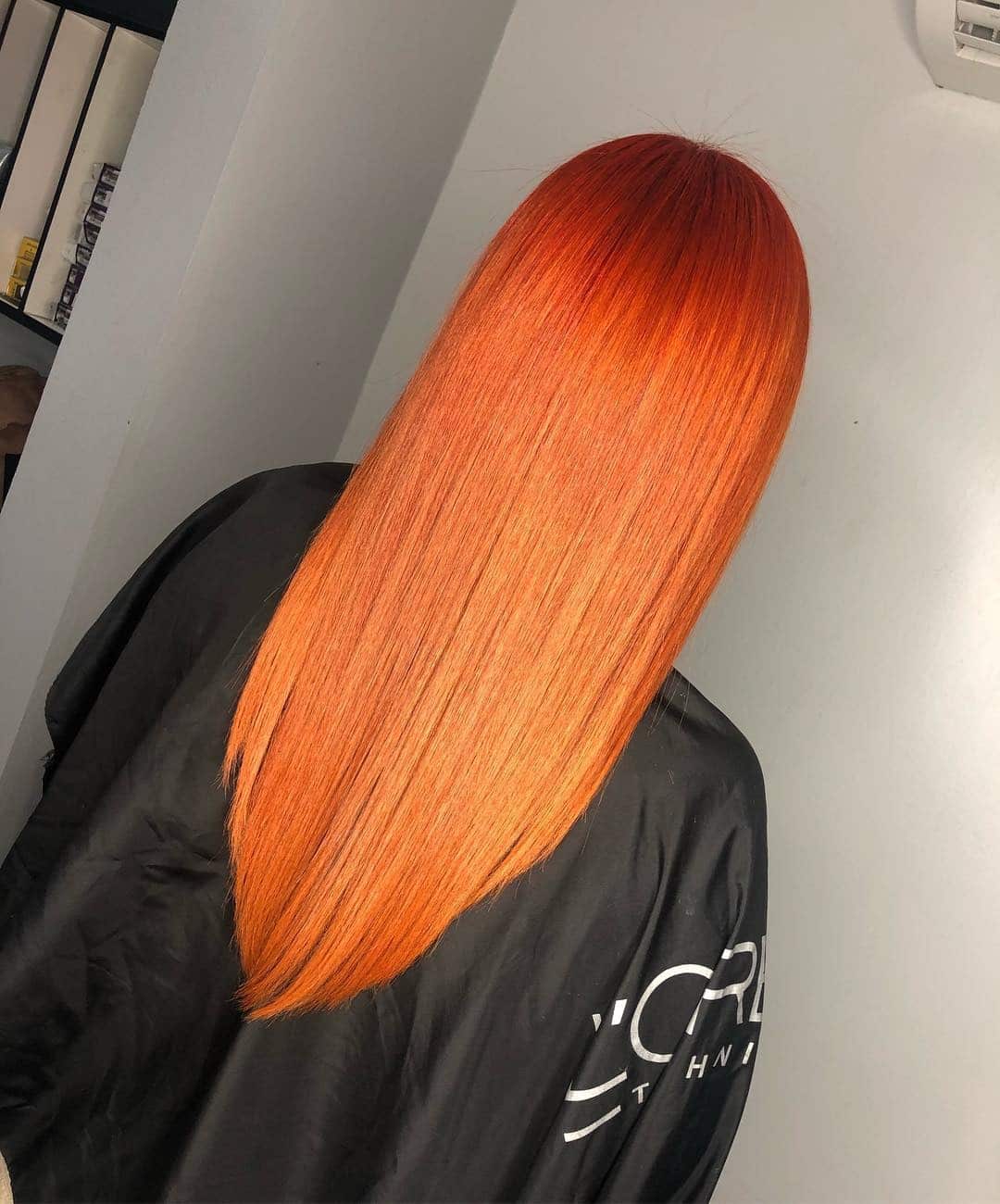 11. Sleek Copper Red Orange Hair - Red Orange Hair Color