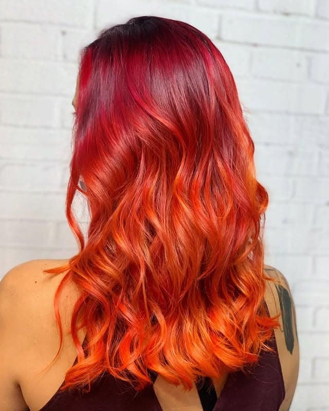 14. Red Orange Melt Balayage - Red Orange Hair Color