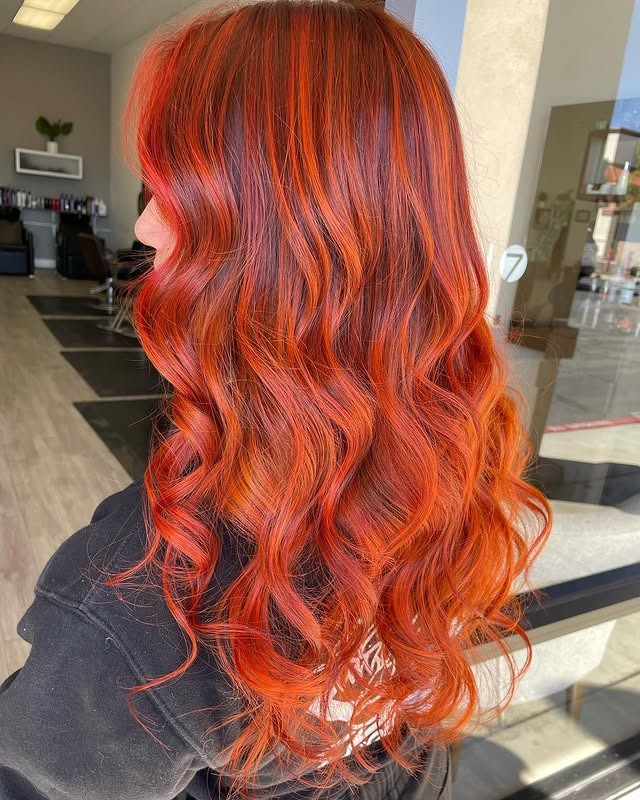15. Dimensional Copper Red Curls - Red Orange Hair Color