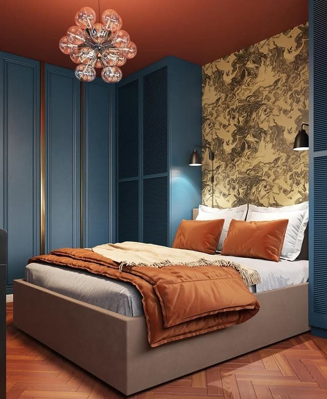 3. Navy Blue Bedroom with Burnt Orange Color Palette - navy blue bedroom ideas