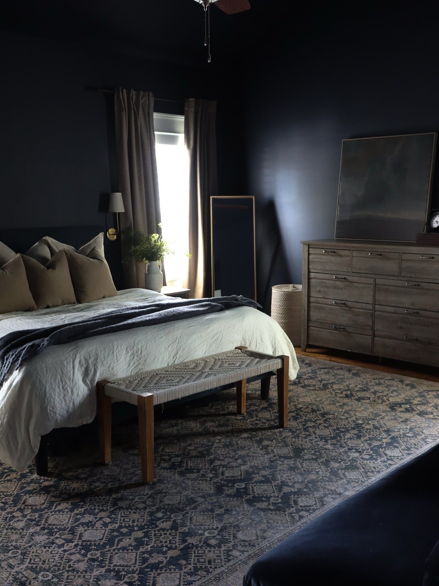 16. Minimalist Navy Blue Bedroom with Warm Wood Tones - navy blue bedroom ideas