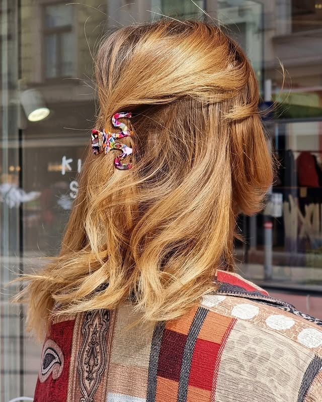 5. Honey Blonde Half-Up Hair with Statement Clip - 80S Hairstyles