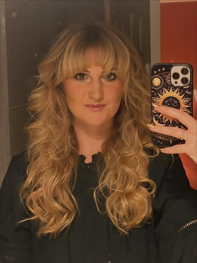 13. Long Golden Blonde Curls with Full Bangs - 80S Hairstyles