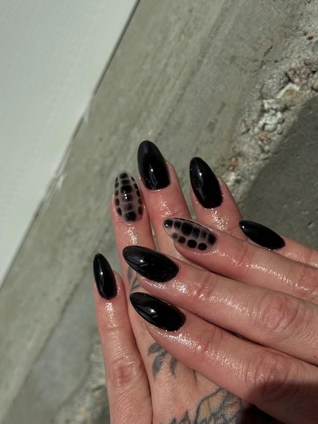 4. Glossy Black Croc Print Almond Nails - short black nail ideas