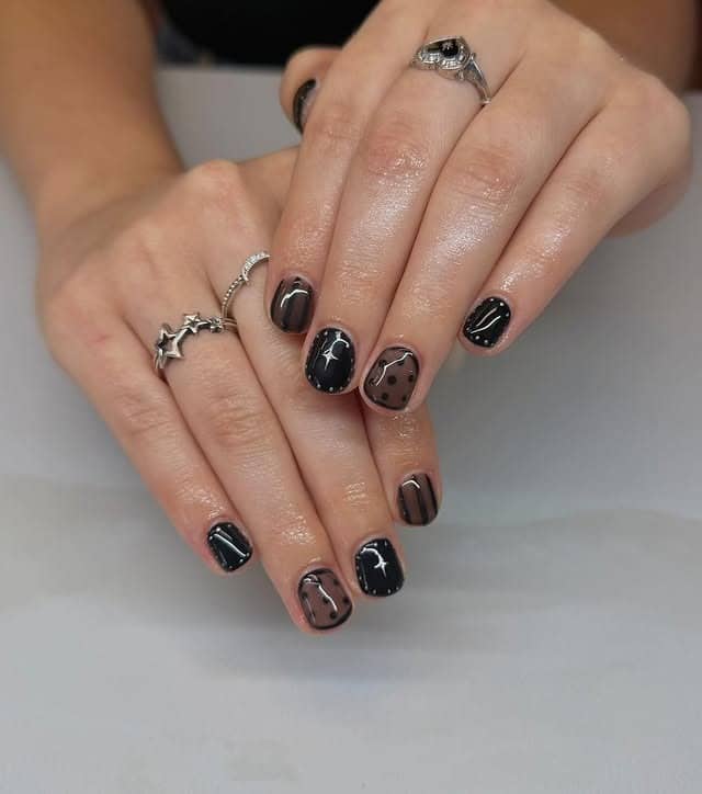 11. Short Black Mix-and-Match Nails - short black nail ideas