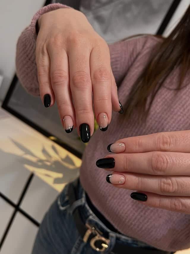 12. Short Black French Nails with Crystal Accents - short black nail ideas