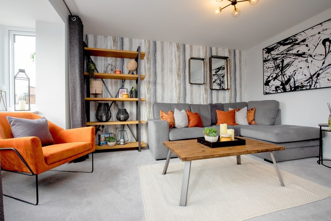 1. Orange Accent Chair with Gray Sectional Living Room Idea - orange and gray living room ideas