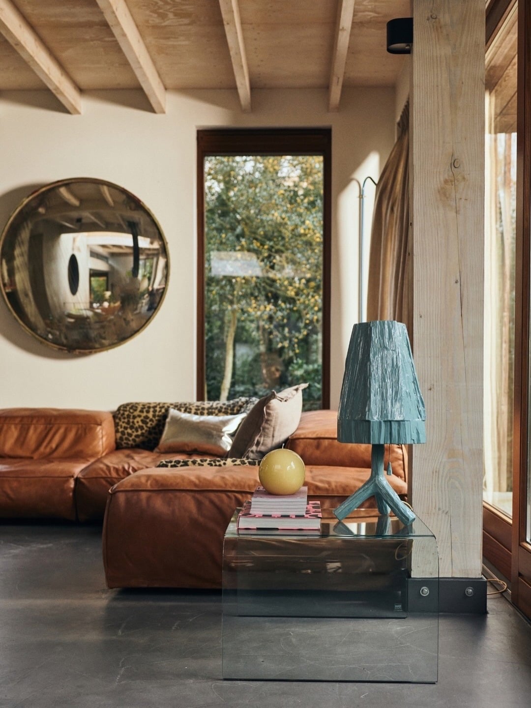 5. Rustic Orange Leather and Gray Living Room Design - orange and gray living room ideas