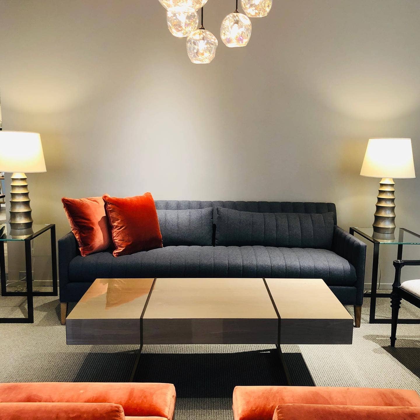 8. Dark Gray Sofa with Burnt Orange Accent Living Room - orange and gray living room ideas