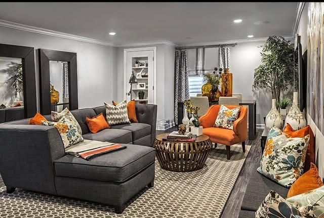 17. Gray Sectional with Orange Accent Chair Living Room - orange and gray living room ideas
