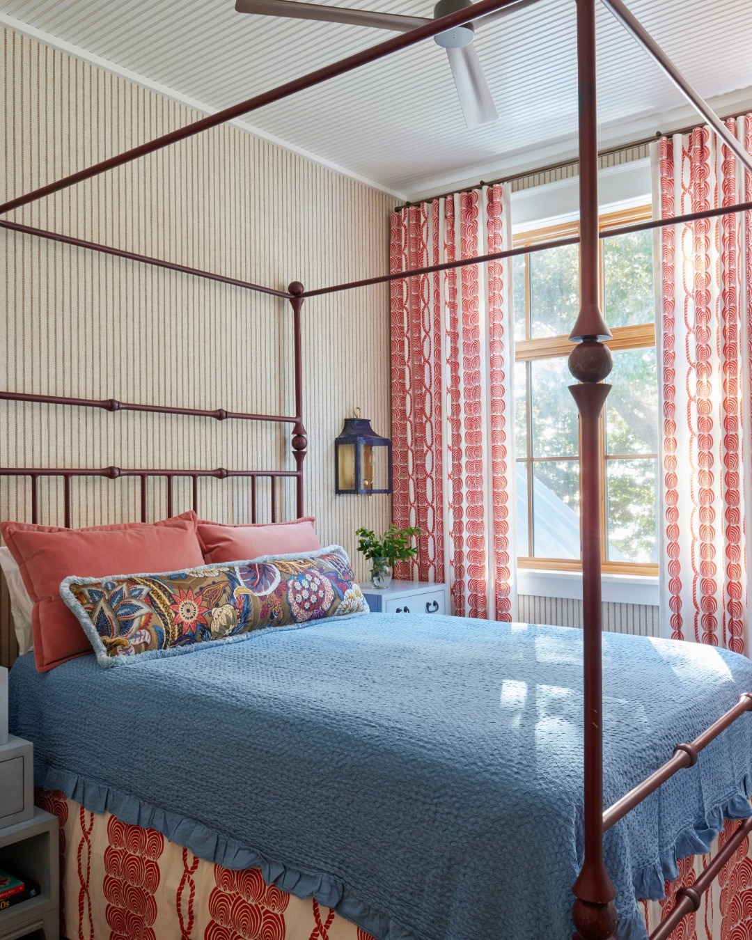3. Coral Accent Nautical Bedroom Idea with Vintage Four-Poster Bed - nautical bedroom ideas