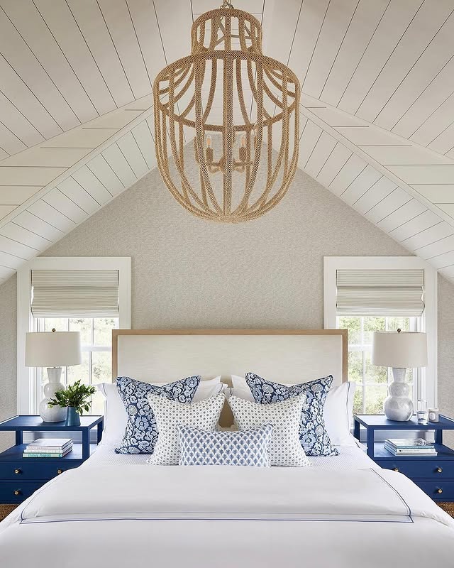 7. Vaulted Ceiling Nautical Bedroom Idea with Blue Nightstands - nautical bedroom ideas
