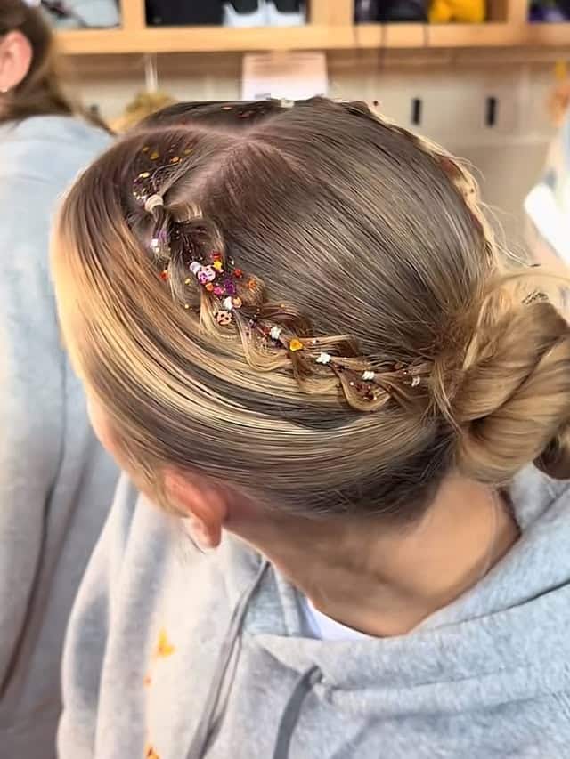 4. Glitter Accent Twist Bun on Ash Blonde Hair - Volleyball Hairstyles