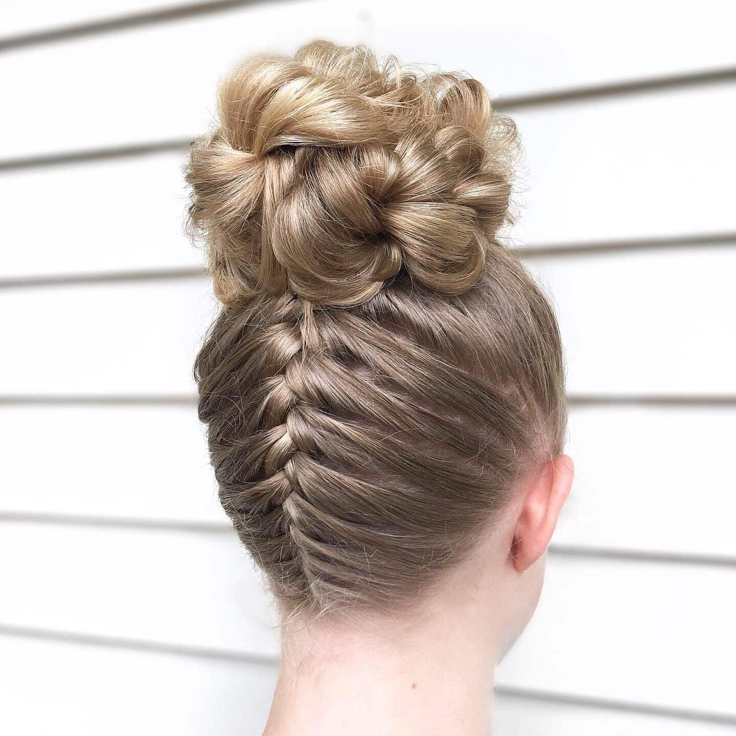 7. Fishtail Braided High Bun on Light Ash Blonde Hair - Volleyball Hairstyles