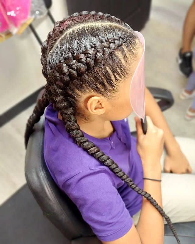 8. Thick Side Dutch Braids on Jet Black Hair - Volleyball Hairstyles