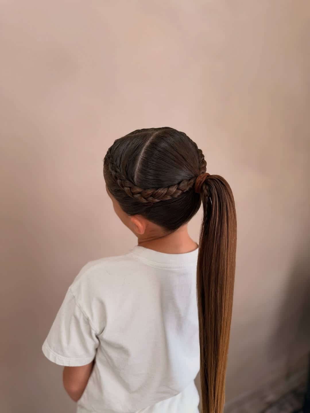 9. Braided Crown Ponytail on Espresso Brown Hair - Volleyball Hairstyles