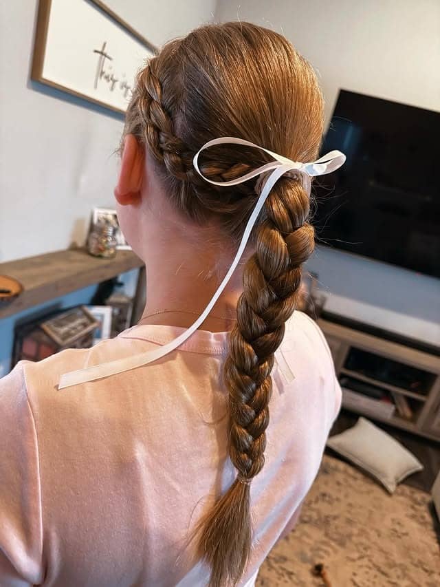 13. Side Accent Braid with Braided Ponytail on Warm Light Brown Hair - Volleyball Hairstyles
