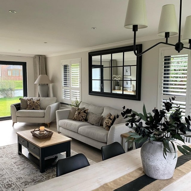 2. Grey and White Living Room with Black Accent Details - grey and white living room ideas
