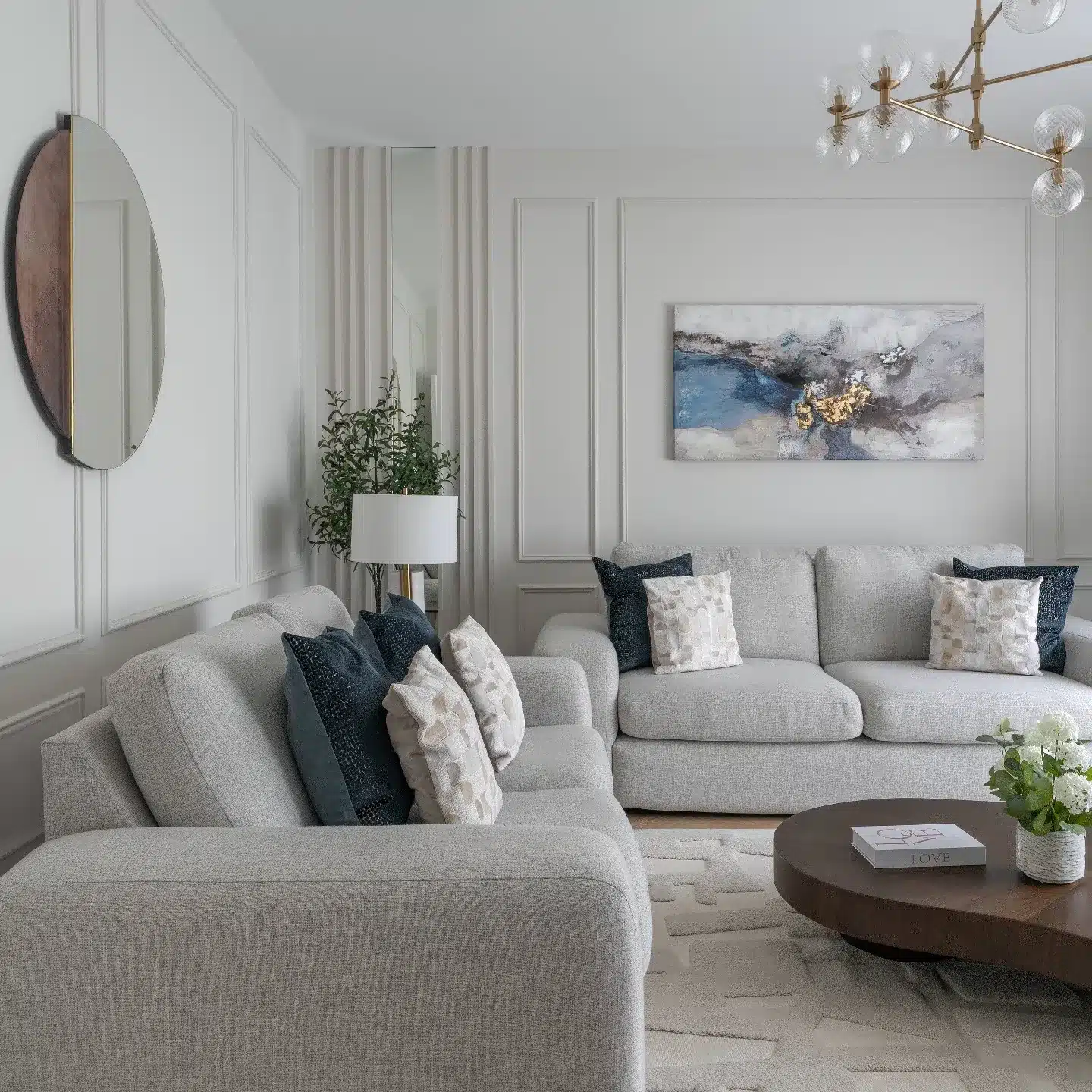 8. Elegant Grey and White Living Room with Blue Accents - grey and white living room ideas