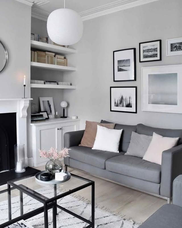 9. Classic Grey and White Living Room with Gallery Wall - grey and white living room ideas