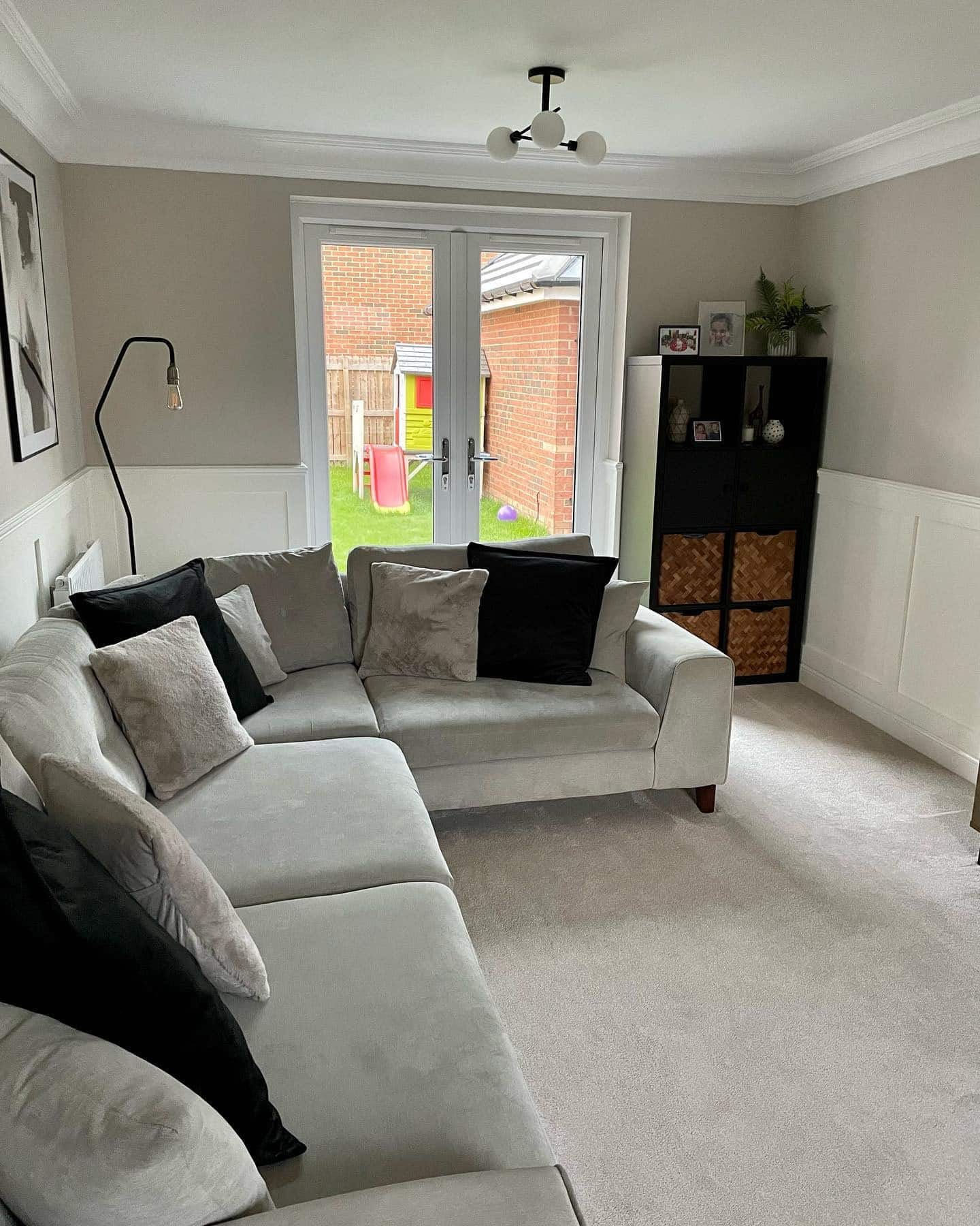 12. Bright Grey and White Living Room with Black Accents - grey and white living room ideas