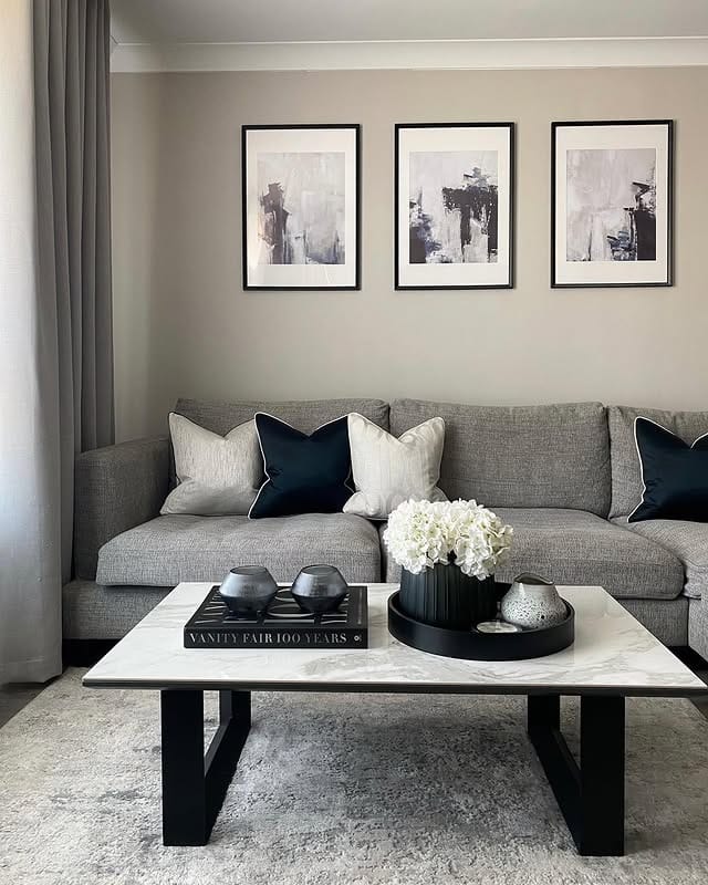 22. Modern Grey and White Living Room with Black Accents - grey and white living room ideas