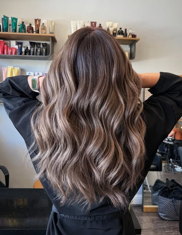 6. Dimensional Milk Tea Balayage with Soft Waves - Milk Tea Hair Color