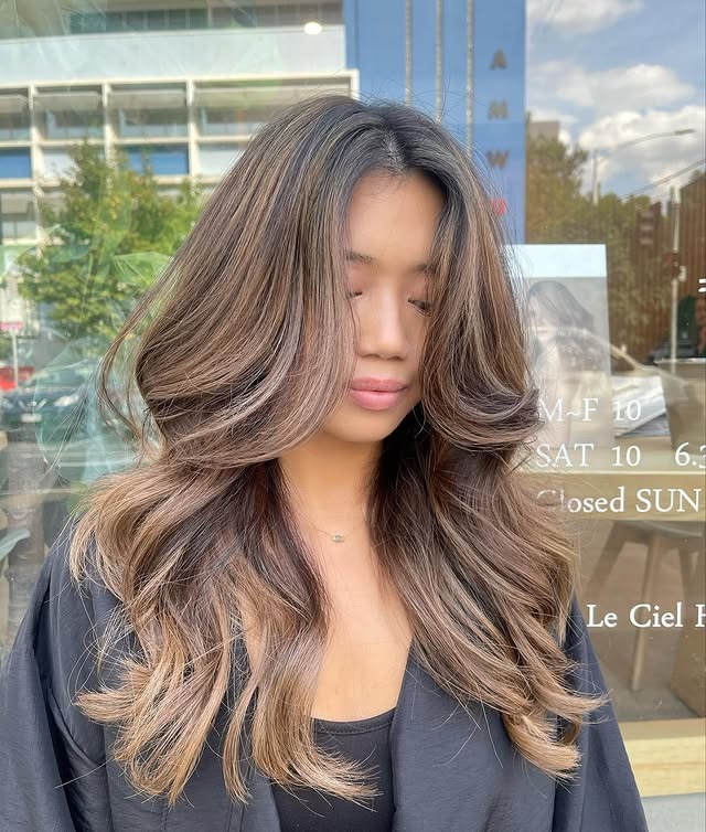 8. Voluminous Curtain Layers with Ash Milk Tea Hair Color - Milk Tea Hair Color