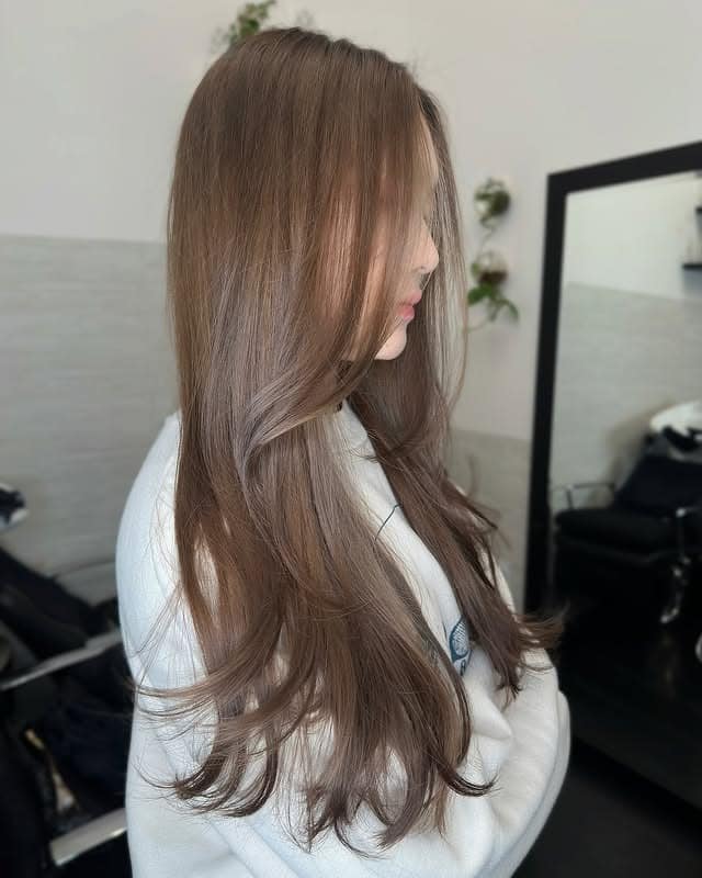 16. Long Layered Cut with Soft Milk Tea Brown - Milk Tea Hair Color