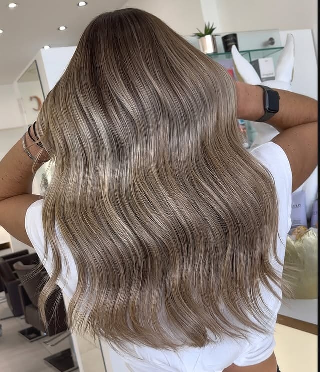 18. Dimensional Milk Tea Balayage with Loose Waves - Milk Tea Hair Color