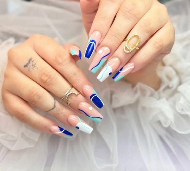 8. Blue Wave Abstract Square Nails - abstract nail ideas