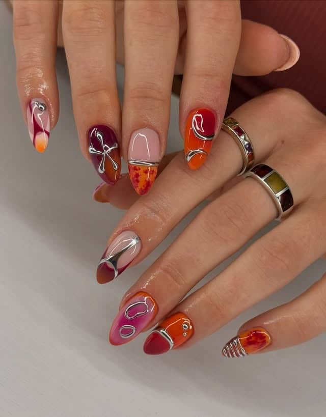 9. Burgundy and Orange Abstract Almond Nails - abstract nail ideas