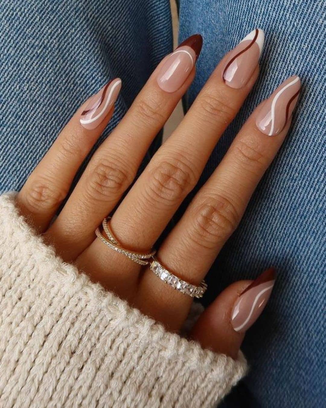 16. Brown and White Abstract Almond Nails - abstract nail ideas