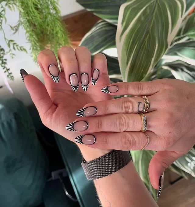 21. Black and White Abstract French Almond Nails - abstract nail ideas
