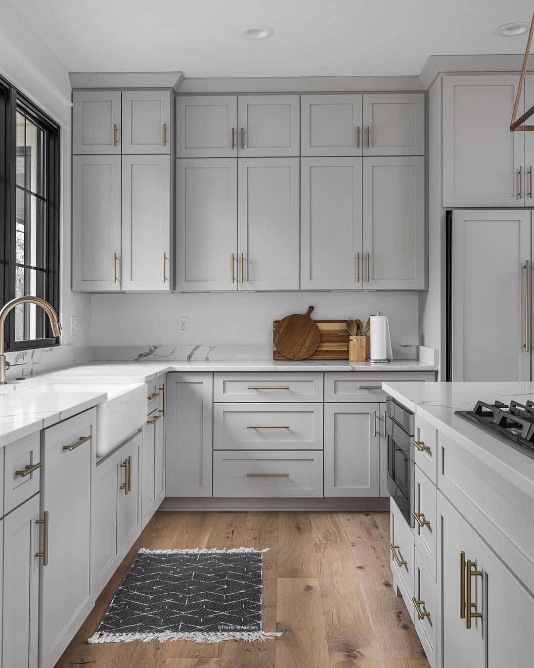 18. Pale Gray Kitchen Cabinets with Gold Hardware - gray kitchen cabinet ideas