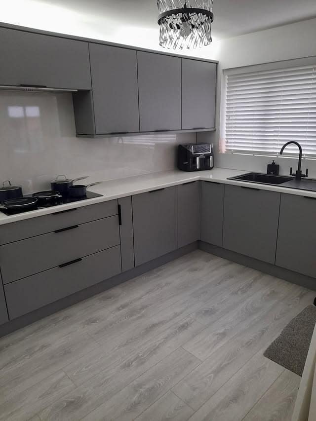 22. Matte Gray Kitchen Cabinets with Minimalist Style - gray kitchen cabinet ideas