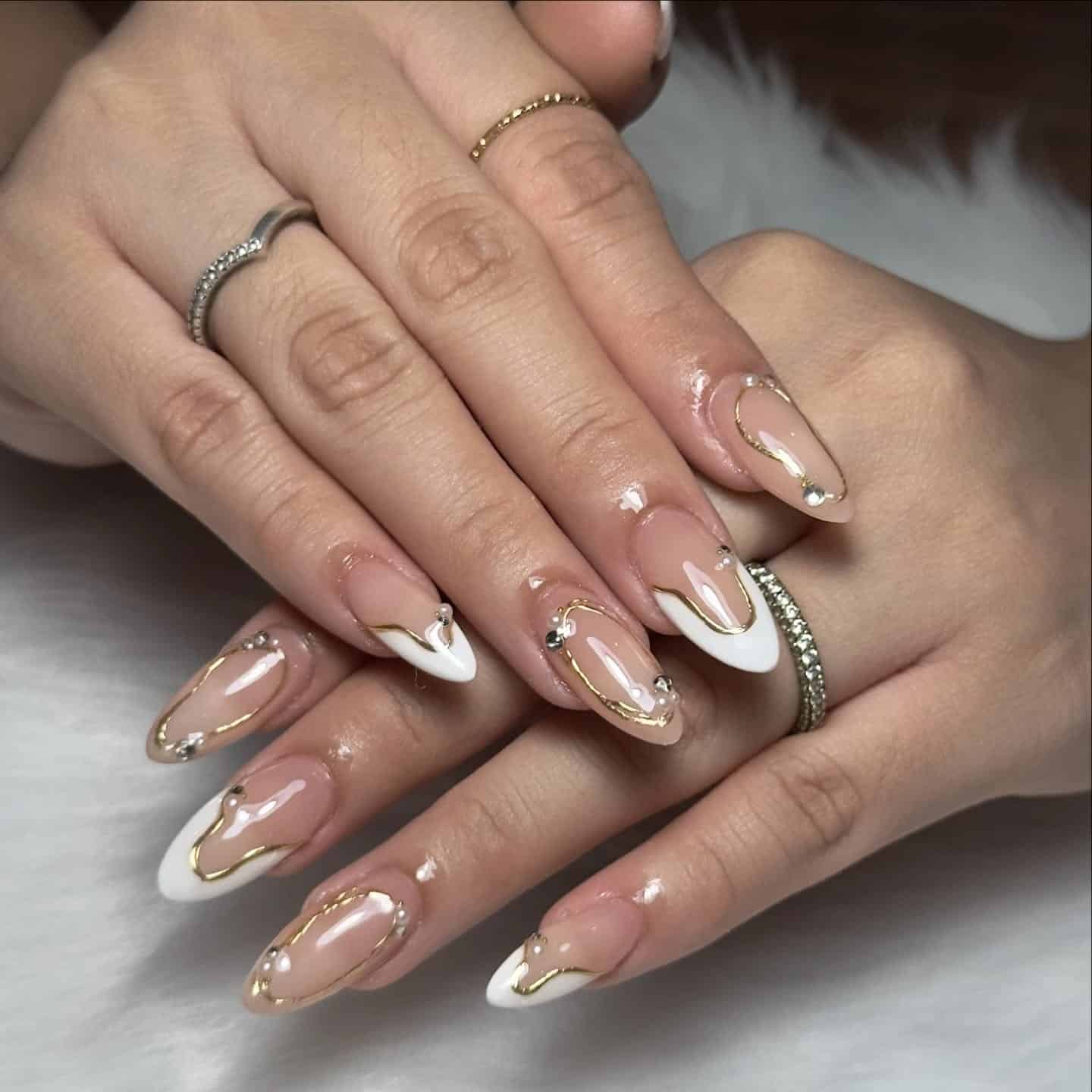 5. White French Almond Nails with Gold Chrome Details - birthday nail ideas
