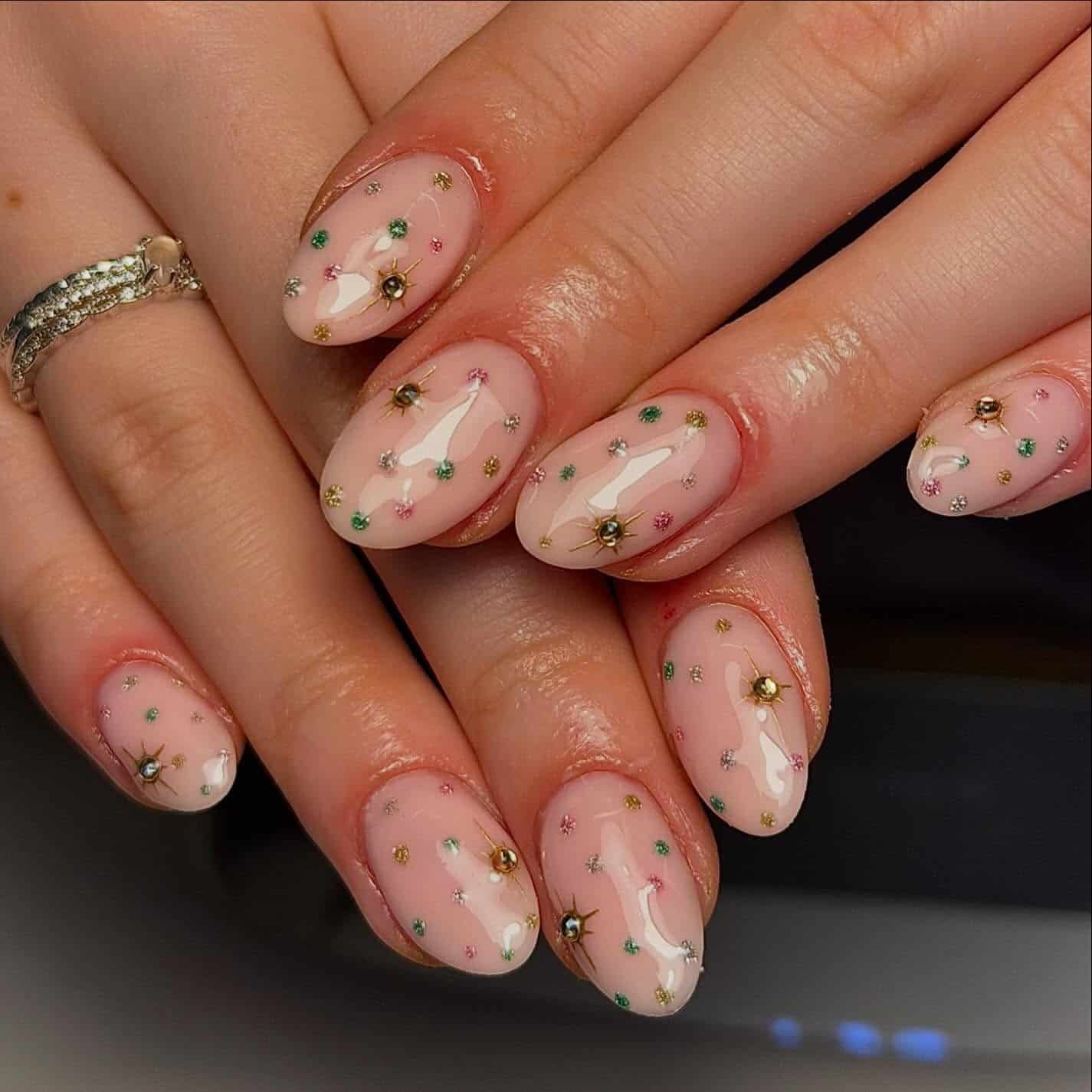 11. Blush Pink Almond Nails with Colorful Crystal Confetti - birthday nail ideas