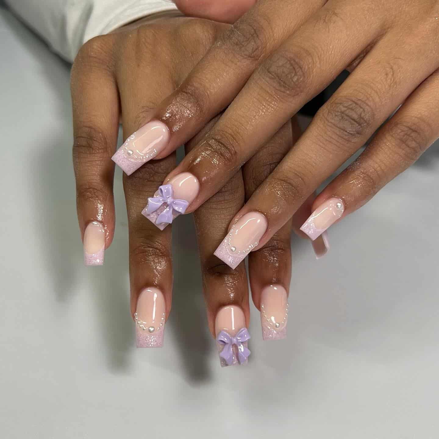 15. Lilac Bow Square Nails with Glitter French Tips - birthday nail ideas