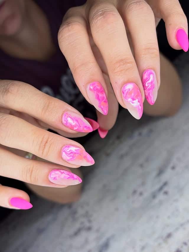 16. Neon Pink Marble Stiletto Nails - birthday nail ideas