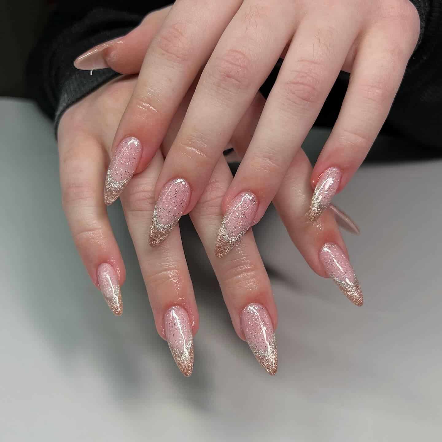 20. Rose Gold Glitter French Stiletto Nails - birthday nail ideas