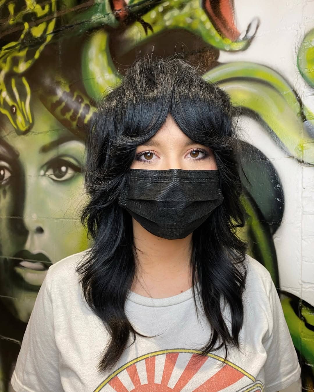 2. Jet Black 70s Shag with Feathered Curtain Fringe - 70S Hairstyles