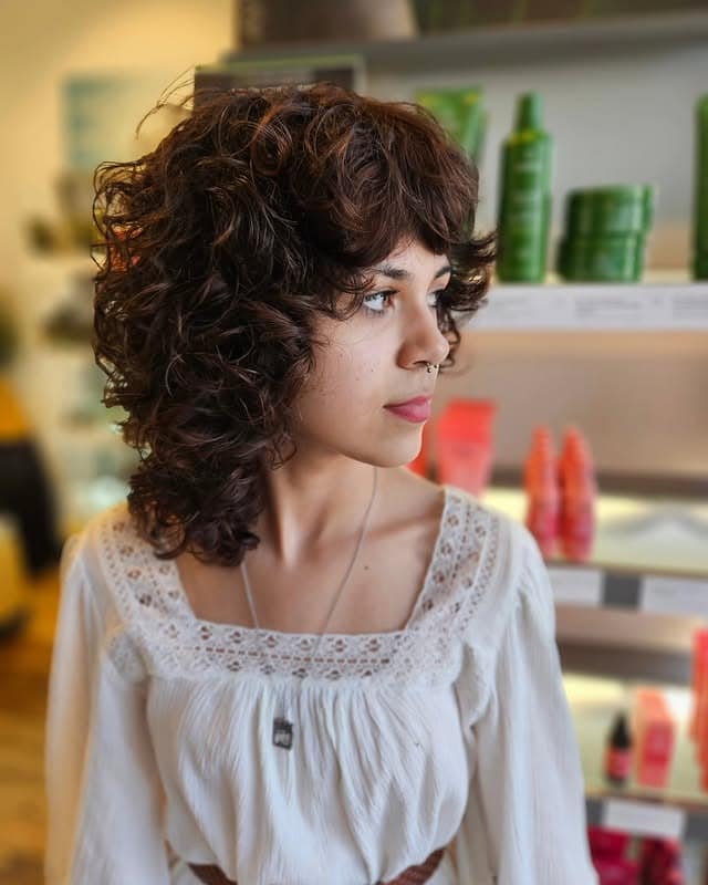 15. Dark Chocolate Brown Curly 70s Shag - 70S Hairstyles