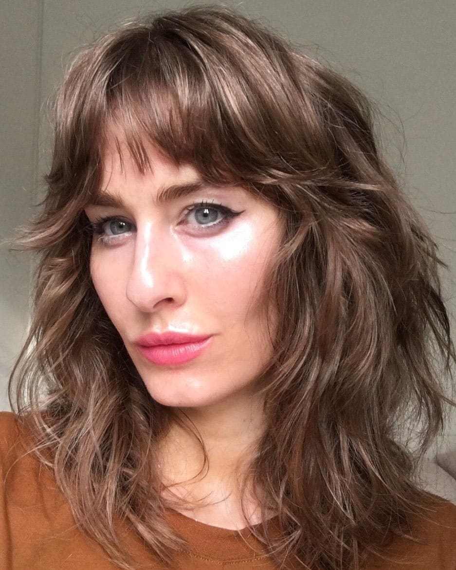 17. Mushroom Brown 70s Wavy Lob with Wispy Bangs - 70S Hairstyles