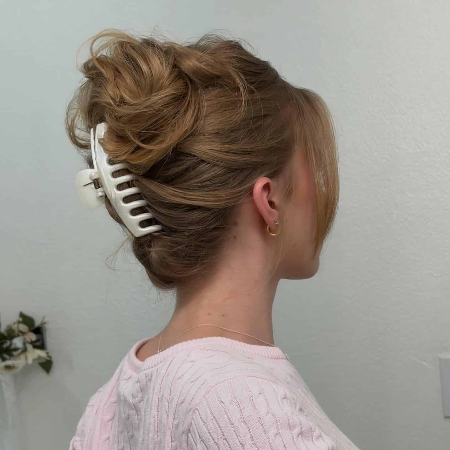 6. Textured Golden Blonde Claw Clip Updo - Claw Clip Hairstyles