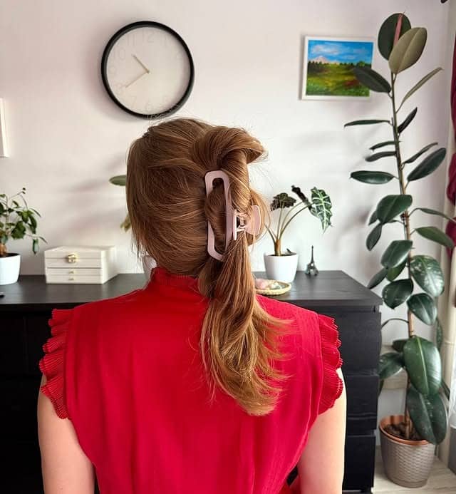 7. Half-Up Strawberry Blonde Claw Clip Style - Claw Clip Hairstyles