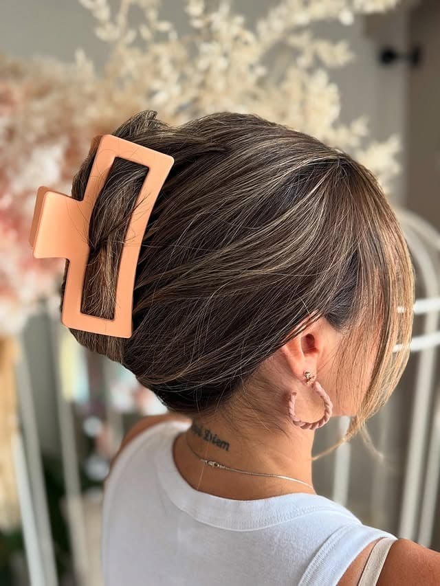 10. Ash Brown French Twist Claw Clip Updo - Claw Clip Hairstyles