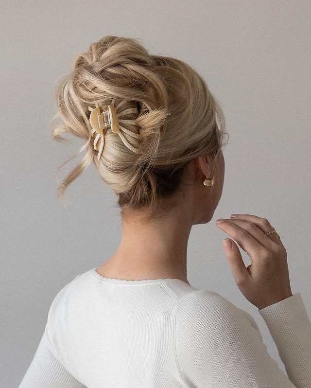 13. Platinum Blonde Textured Claw Clip Bun - Claw Clip Hairstyles